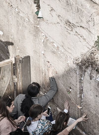 High angle view of people on wall