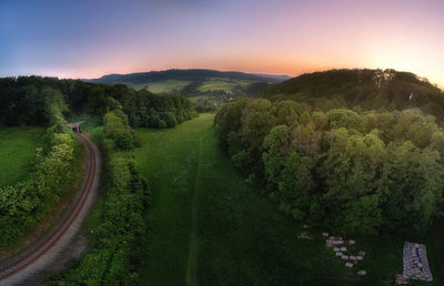 Scenic view of landscape against sky during sunset