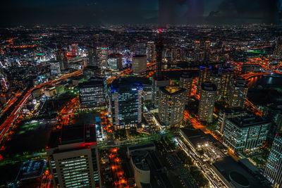 High angle view of illuminated cityscape at night