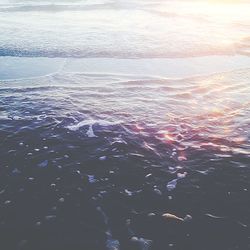 High angle view of sea against sky during sunset