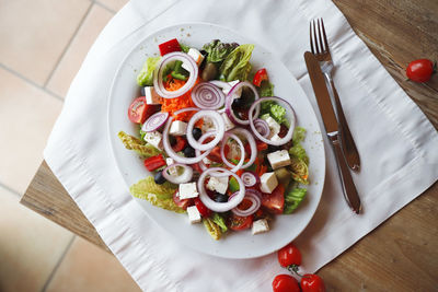 High angle view of fruits in plate on table