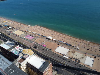 High angle view of city by sea