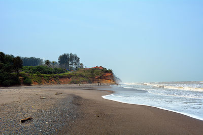 Scenic view of beach against clear sky