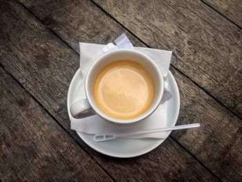 High angle view of coffee cup on table