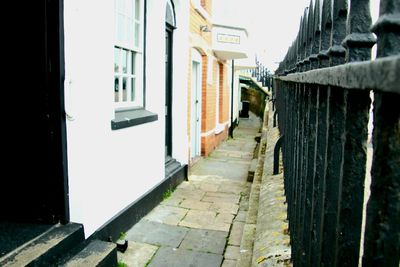 Alley amidst buildings in city