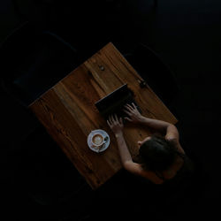 Midsection of man using smart phone