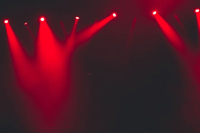 Close-up of illuminated red light painting at night