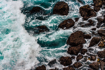 Full frame shot of rocks on beach