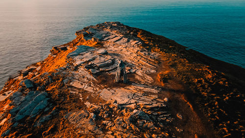 Aerial view around the monument to king arthur in britain monument close up on sea background.