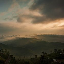 Scenic view of landscape against sky during sunset