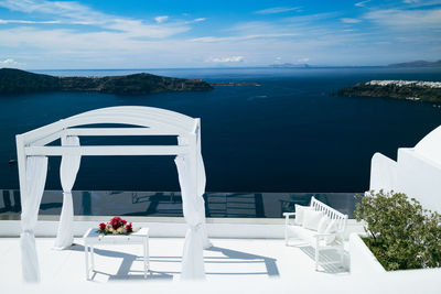 Wedding altar view to caldera and nea kameni volcano in santorini, greece