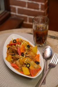 Close-up of food served on table