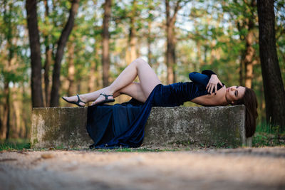 Woman relaxing on a tree