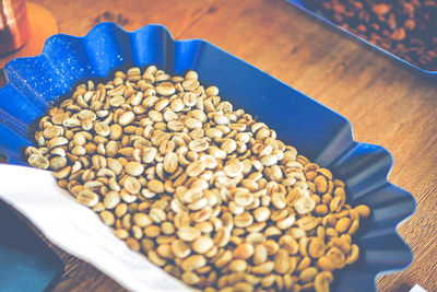 High angle view of coffee beans on table