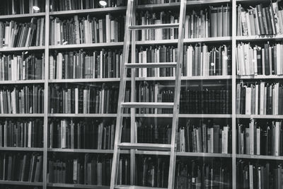 Full frame shot of bookshelf in library