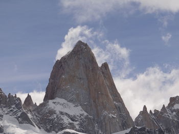 Panoramic view of snowcapped mountains against sky