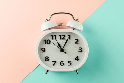 Close-up of clock on wall