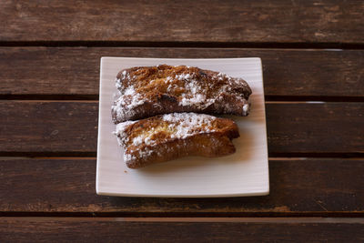 Biscuit dessert with powdered icing sugar