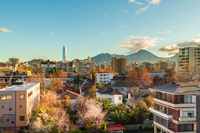 High angle view of buildings in city against sky