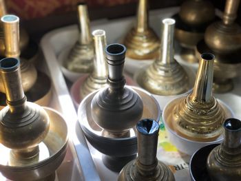 Close-up of metallic container on tray