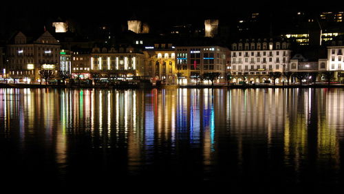 Reflection of illuminated buildings in water
