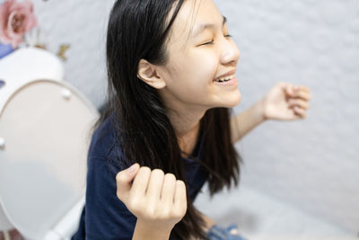 Portrait of a smiling young woman