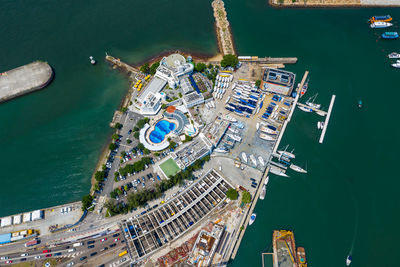 High angle view of boats moored at harbor