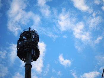 Low angle view of street light against sky