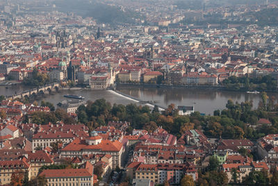 High angle view of river amidst buildings in town