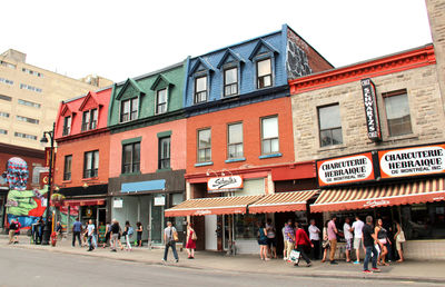 People in front of building