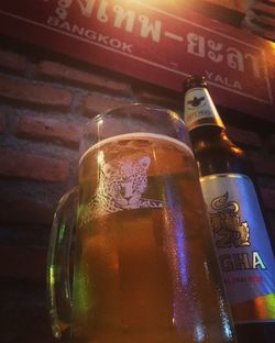 Close-up of beer glass on table