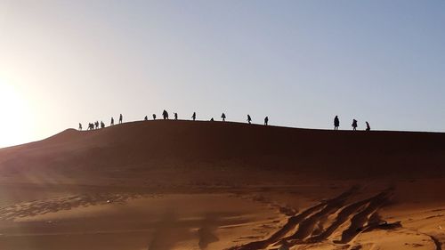 Silhouette on  redsand in mujahimiyah, saudi arabia