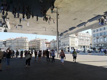 People on street in city