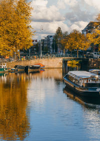 Scenic view of river against sky during autumn