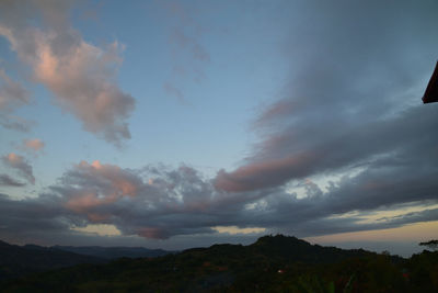 Low angle view of silhouette mountain against sky during sunset