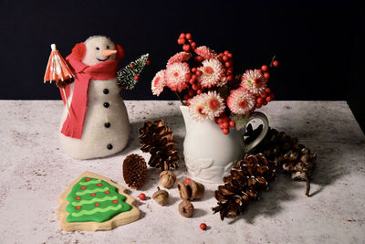 Close-up of christmas decorations on table