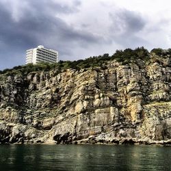 Scenic view of sea against cloudy sky