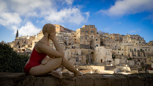 Low angle view of statue against sky