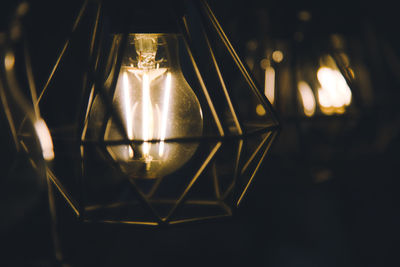 Close-up of illuminated light bulb