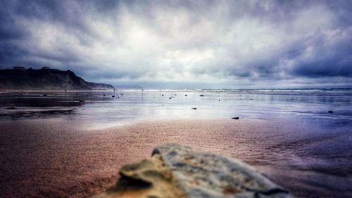 Scenic view of beach against sky