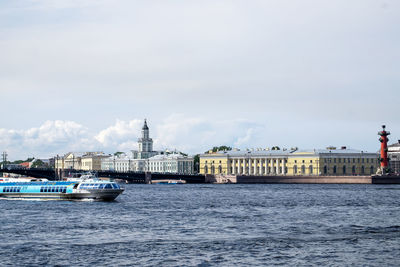 Saint-petersburg, russia. - august 11, 2021. view of museums, bridge and neva river