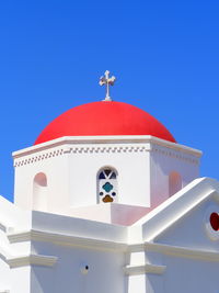 High section of church against blue sky