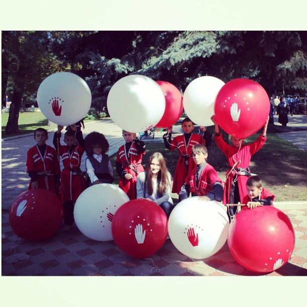 transfer print, auto post production filter, red, still life, celebration, indoors, food and drink, large group of objects, close-up, variation, no people, tradition, balloon, ball, high angle view, day, childhood, decoration, toy