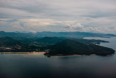 Aerial view of bay against sky