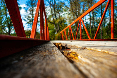 Close-up of metallic bridge in park