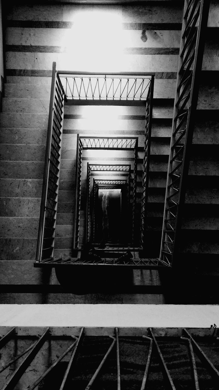 LOW ANGLE VIEW OF STAIRS IN THE BUILDING