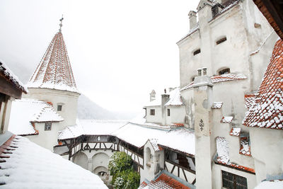 Snow covered bran castle at transylvania