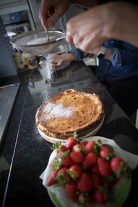 Midsection of person preparing food