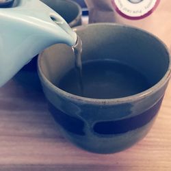 Close-up of coffee cup on table