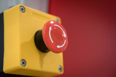Close-up of alarm button on wall